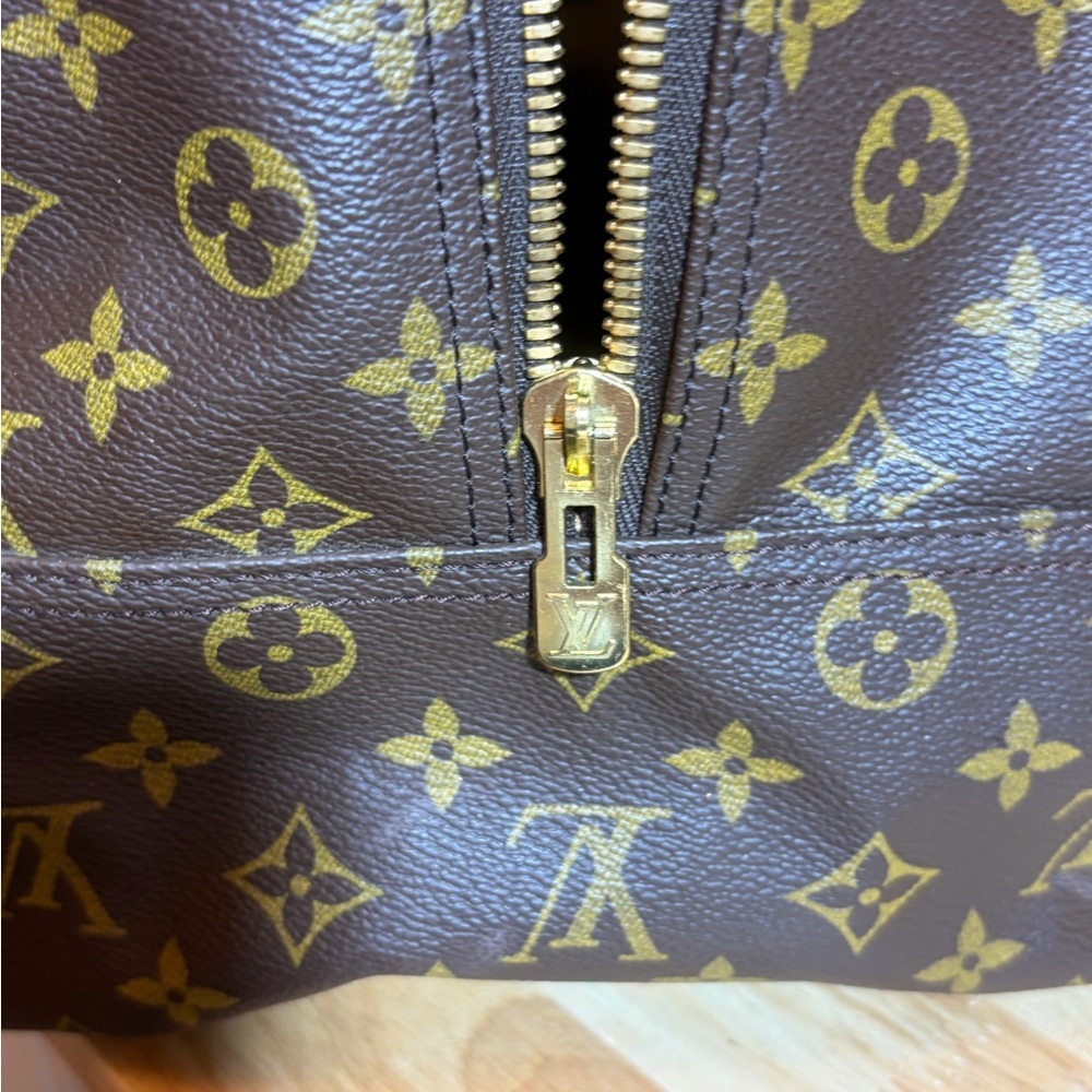 Louis Vuitton Evasion Monogram Travel Bag - Picture 11 of 16